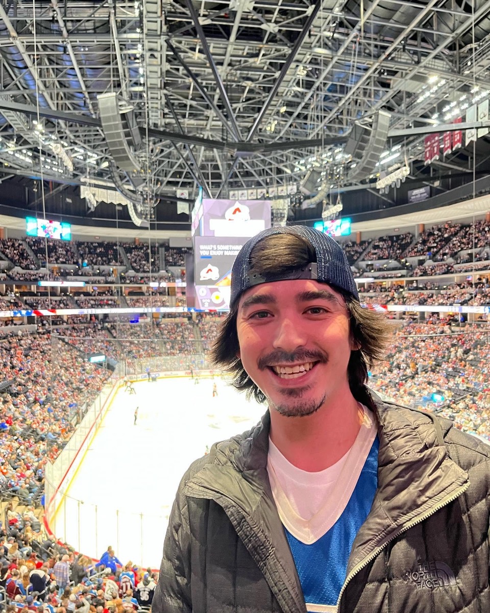 Zach at an Avalanche game at Ball Arena